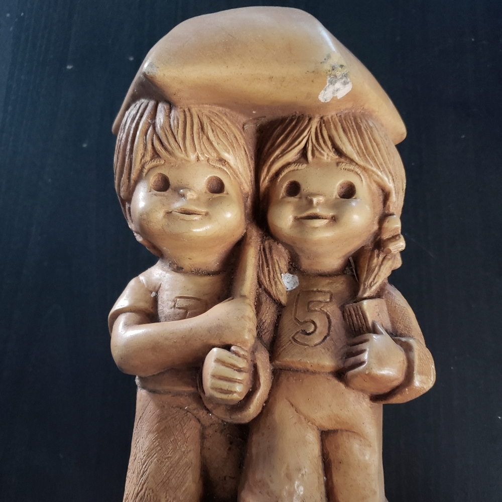 Charming Brown Figurine of Two Children